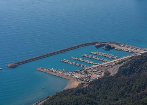 A stunning aerial view of Antalya's marina with moored boats in summer.