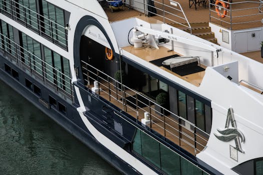 Close-up of a luxury cruise ship showcasing exterior details while docked.