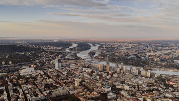 Stunning aerial view of Belgrade, Serbia, featuring the city's skyline and rivers.