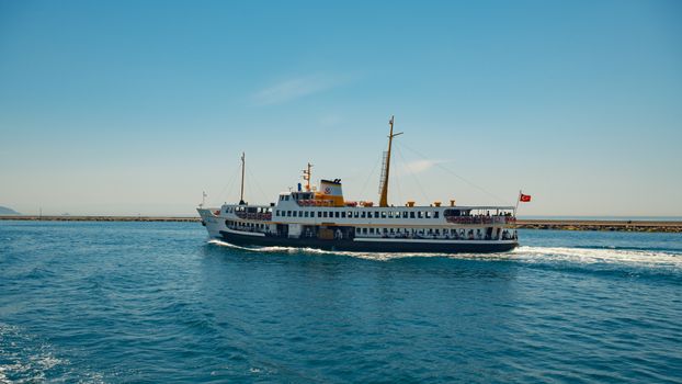 Relaxing ferry trip on the Bosphorus, capturing the essence of Istanbul's maritime charm under a clear summer sky.